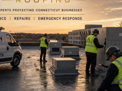 Crown Roofing & Exteriors crew performing commercial roofing in Connecticut