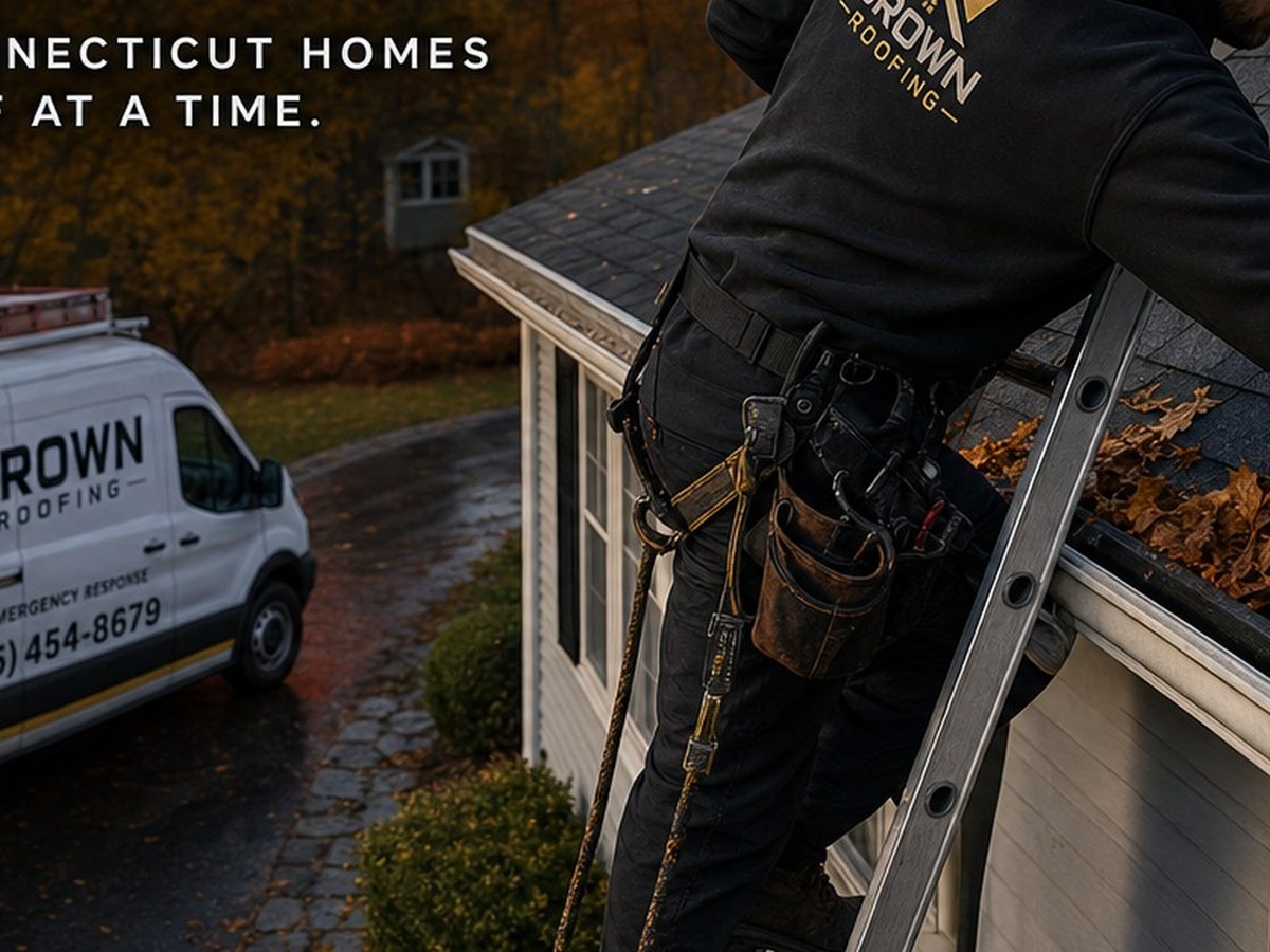 Crown Roofing crew performing roof maintenance in Connecticut